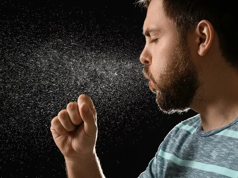 Virus cúm A lây qua các hạt hô hấp khi ho, hắt hơi hoặc nói chuyện